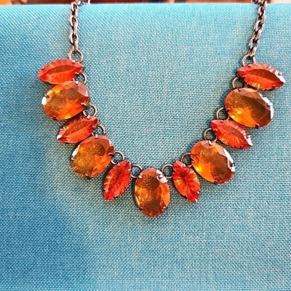151. Statement necklace: Pewter colored chain with pink & amber stones